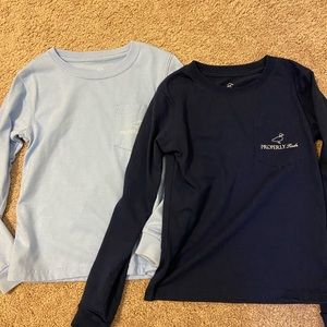 Two properly tied long sleeve T-shirts.